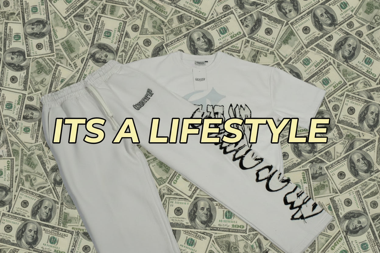 White t-shirt and pants with black text on a light gray background